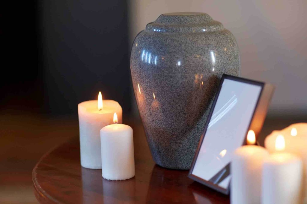 Urn next to candles